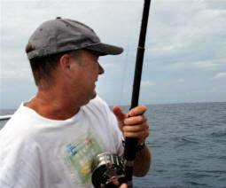 Frank reels the 31 ound dorado in