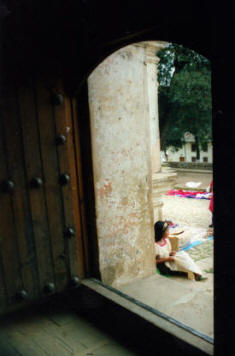 In the doorway of a church al San Cristobal de las Casas, Chiapas Mexico Photography by Bill Bell