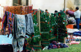 Blue jeans and christmas trees christmas Eve in the Cathedral San Cristobal de las Casas, Chiapas Mexico Photography by Bill Bell