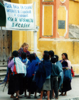 Swarmed by vendors dorothy bell christmas Eve in the Cathedral San Cristobal de las Casas, Chiapas Mexico Photography by Bill Bell