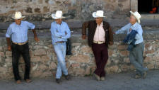 White cowboy hats on the streets of Alamos