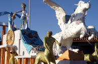 Floats and Queens and people enjoying themselves dominate one of the several major parades during Mazatlan's Mardi Gras...Bill Bell Photograph