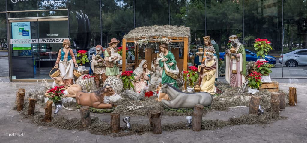 An elaborate outdoor nativity scene comes to life with intricate figures and festive lights, highlighting Mexico’s deep-rooted tradition of honoring the birth of Christ.