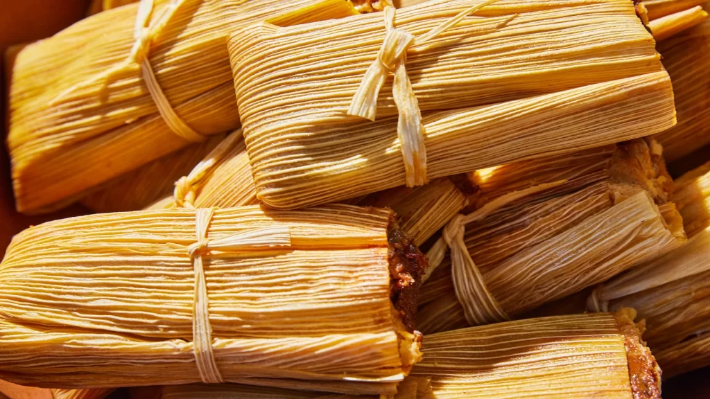 TamalesA seasonal holiday food made from cornmeal masa and filled with a variety of fillings.